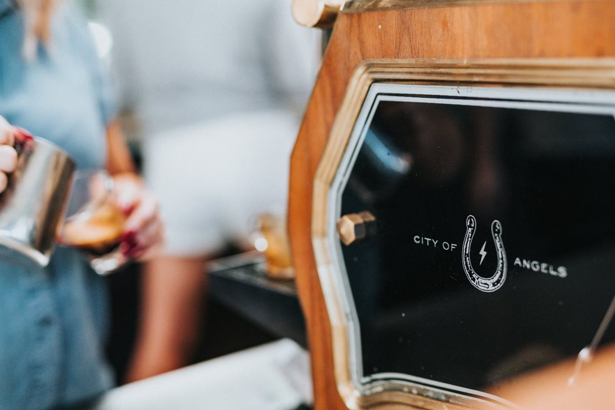 An espresso machine from Stumptown Coffee Roasters with the words "City of Angels" on it.